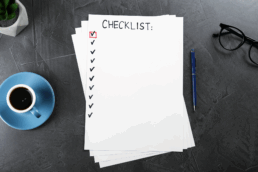 A sheet of paper with a list of 10 blank checks
